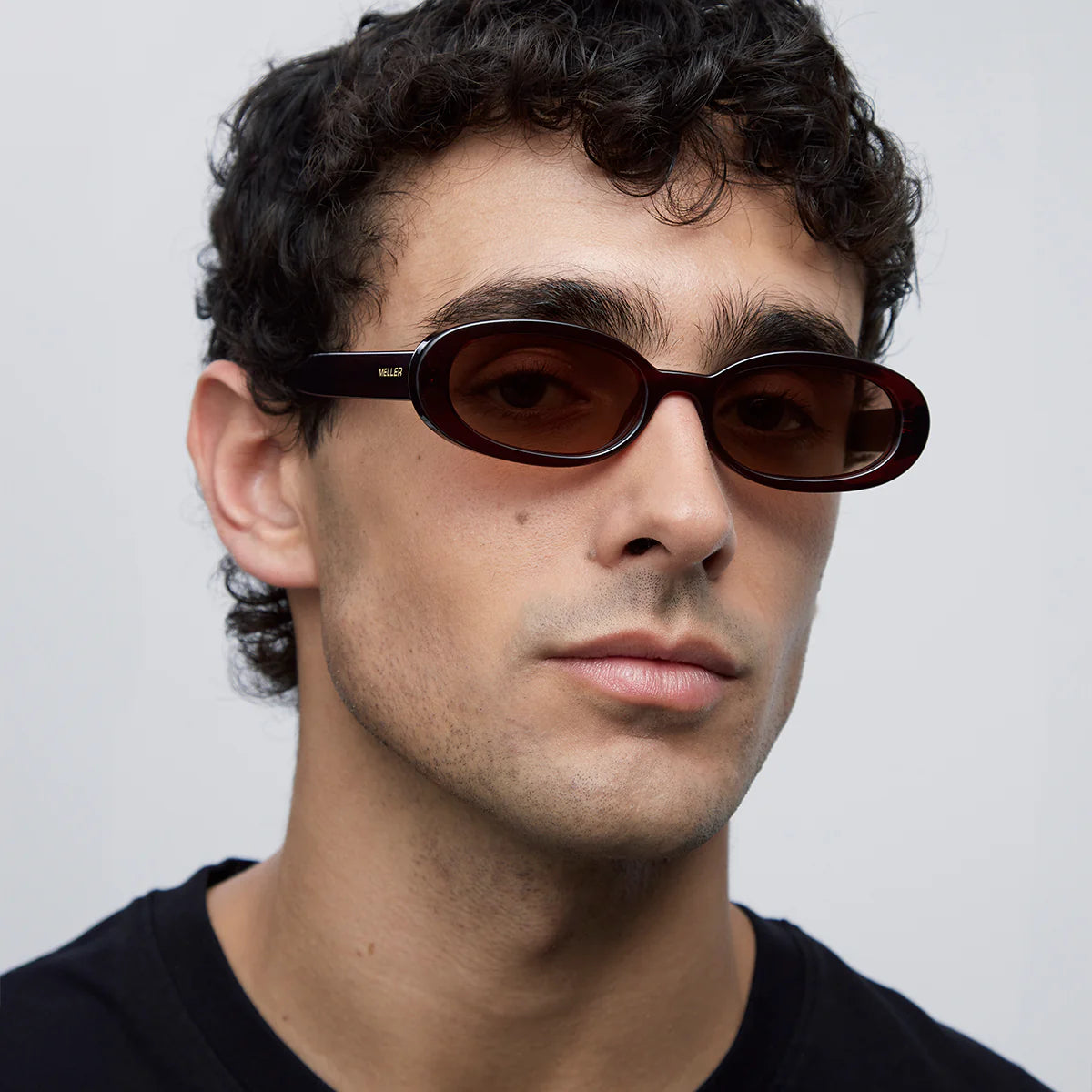 Man wearing red meller kai sunglasses