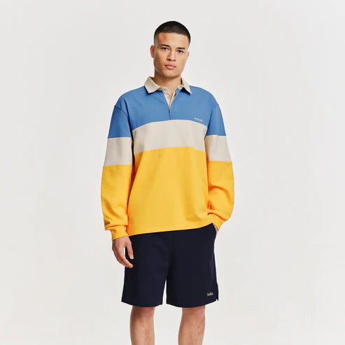 parlez strive rugby shirt yellow blue on model