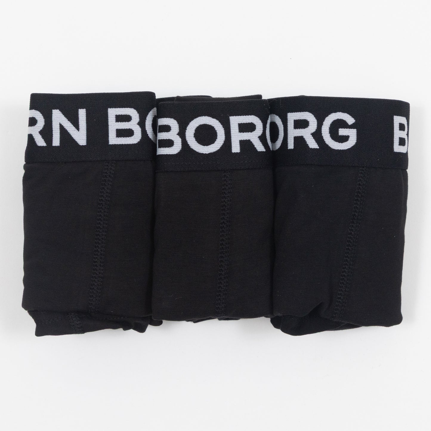 Three black trunk boxer shorts with BJORN BORG branding on the waistband, displayed against a white background.