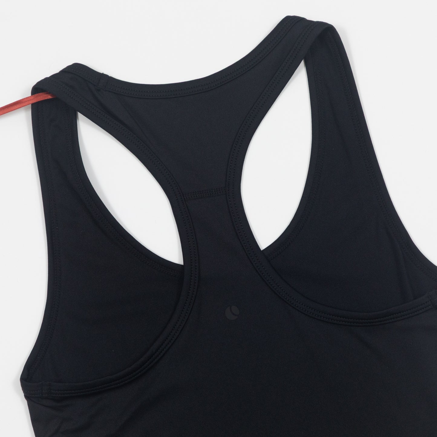 Black tank top on a white background