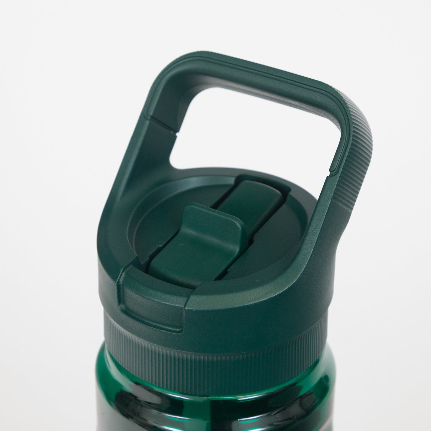 Green Yeti plastic water bottle with straw cap closed