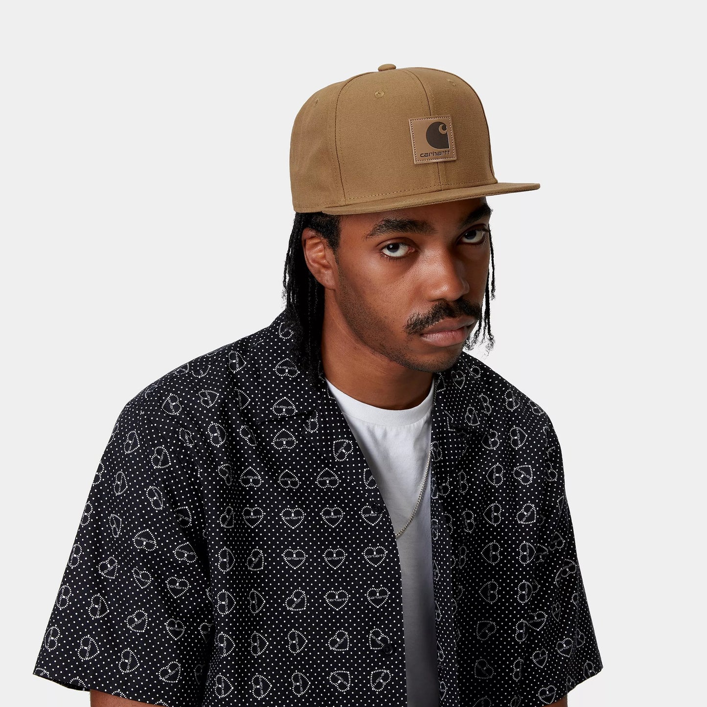 Man wearing a brown Carhartt cap