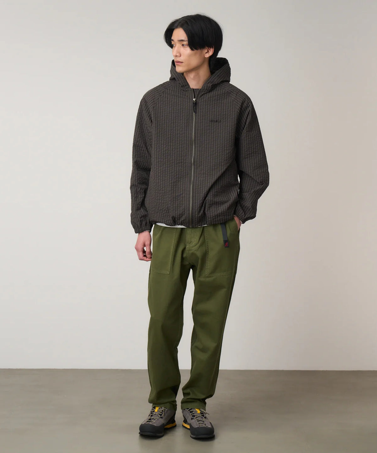 GRAMICCI Loose Tapered Ridge Trousers in Green