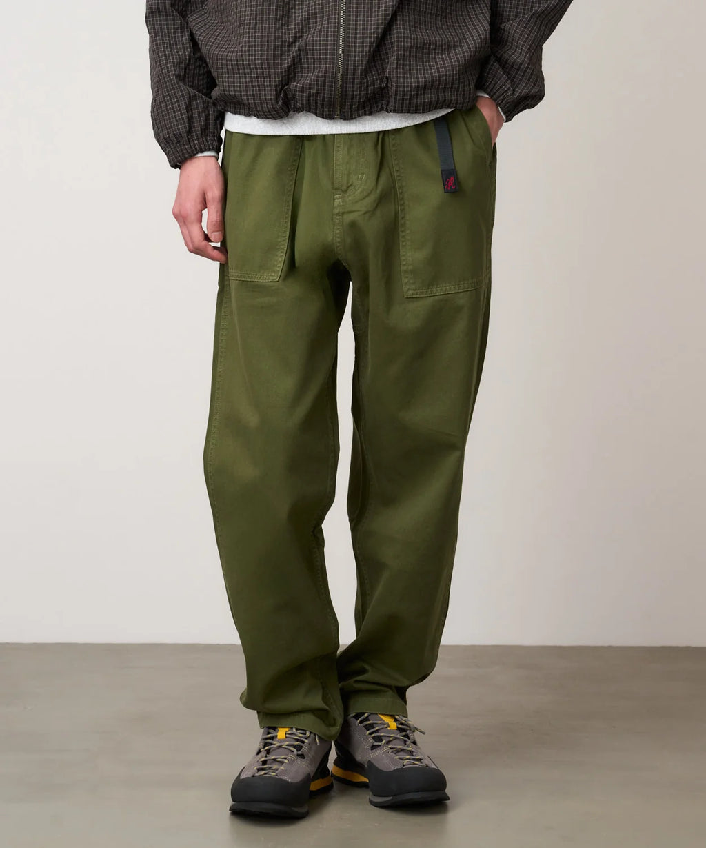GRAMICCI Loose Tapered Ridge Trousers in Green