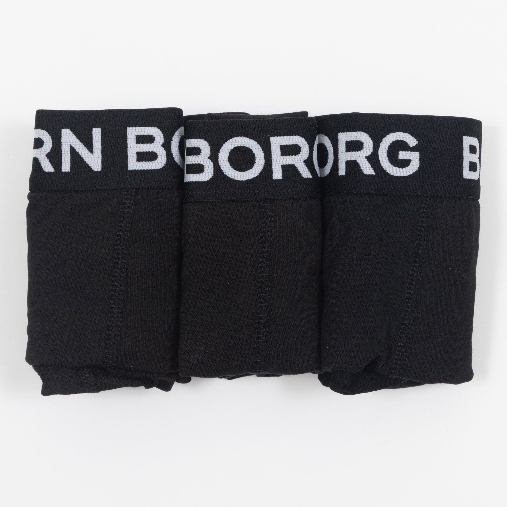 Three black trunk boxer shorts with BJORN BORG branding on the waistband, displayed against a white background.