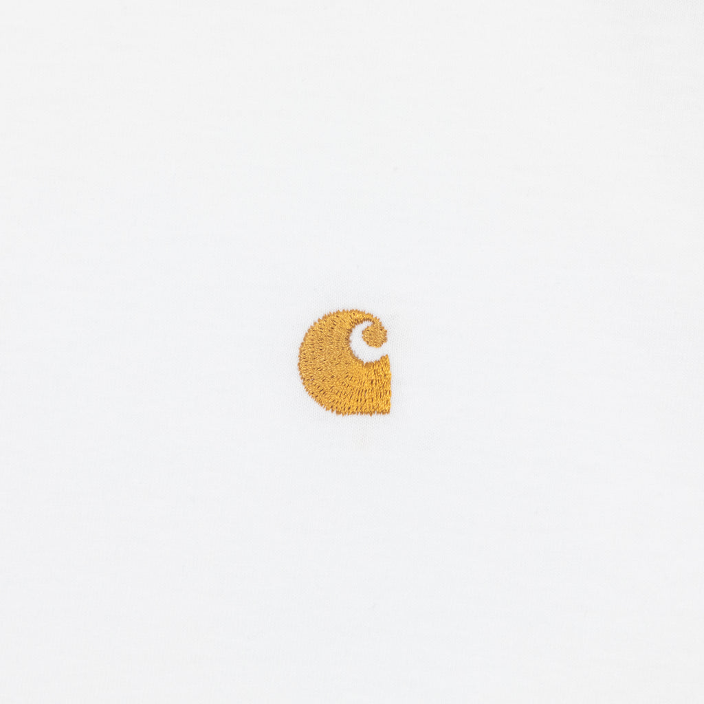 Gold Carhartt logo on a white tshirt