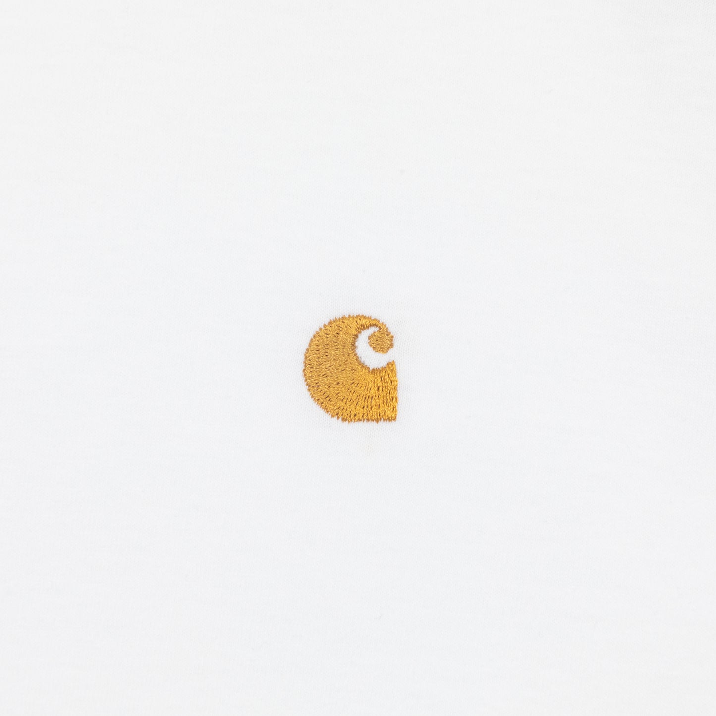 Gold Carhartt logo on a white tshirt