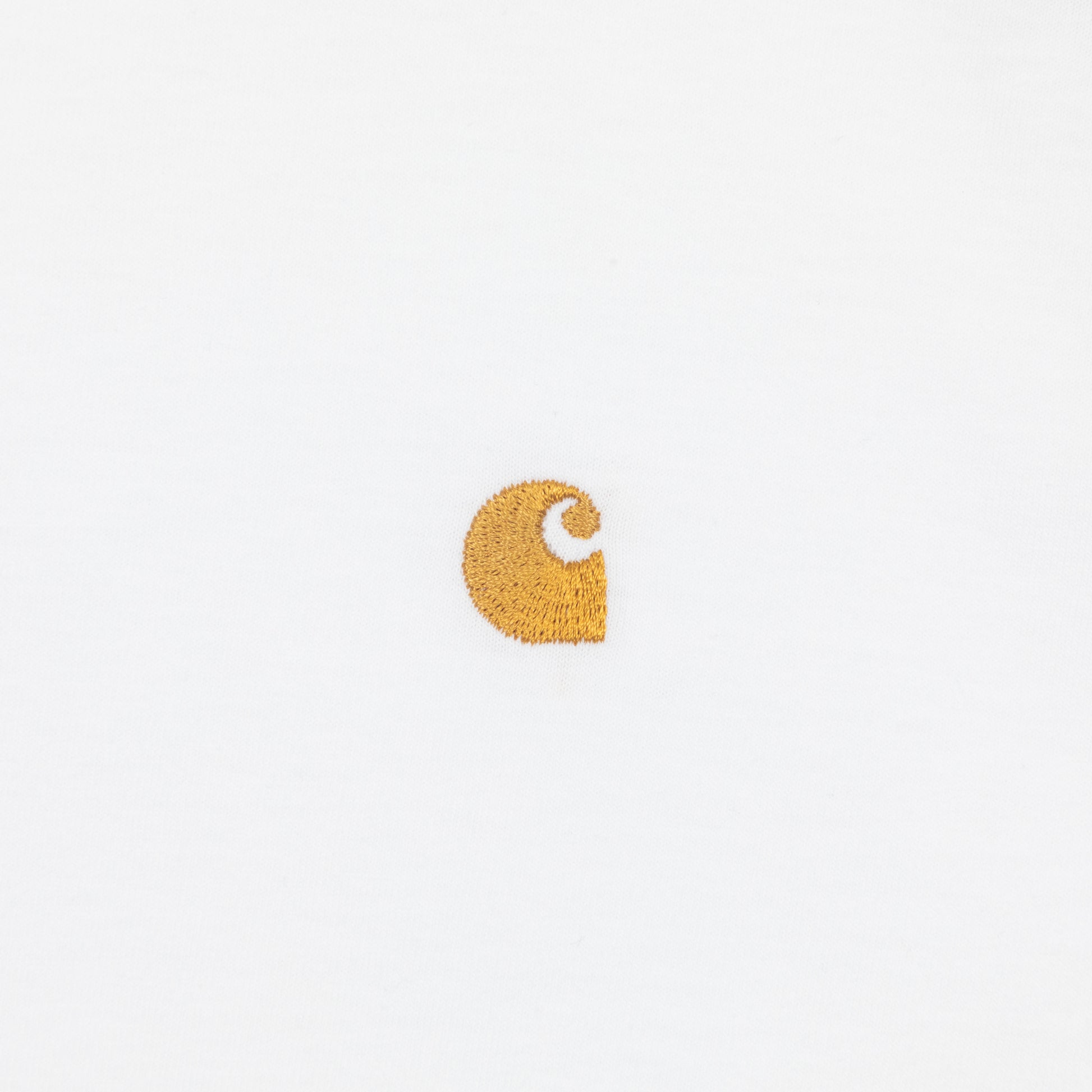 Gold Carhartt logo on a white tshirt
