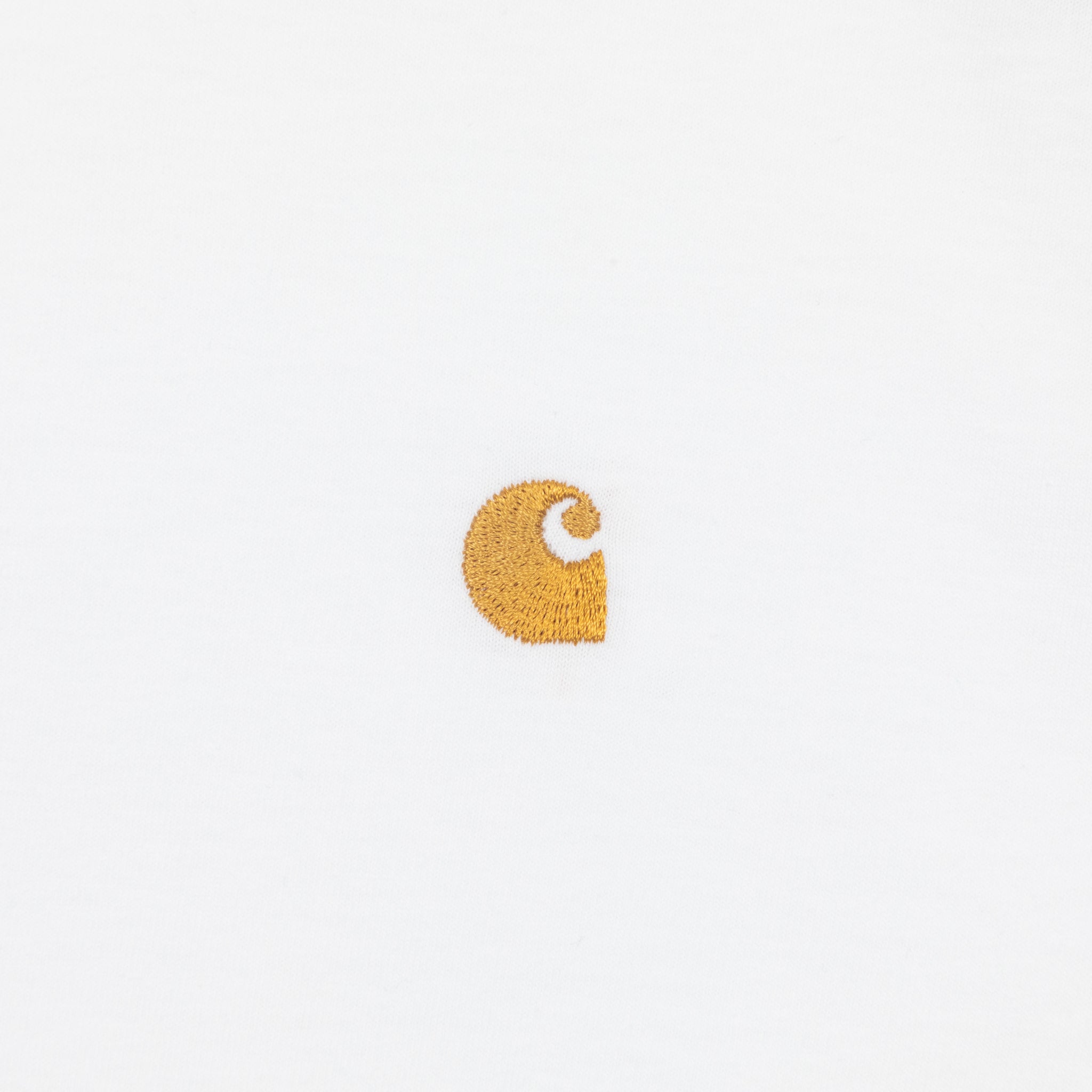 Gold Carhartt logo on a white tshirt