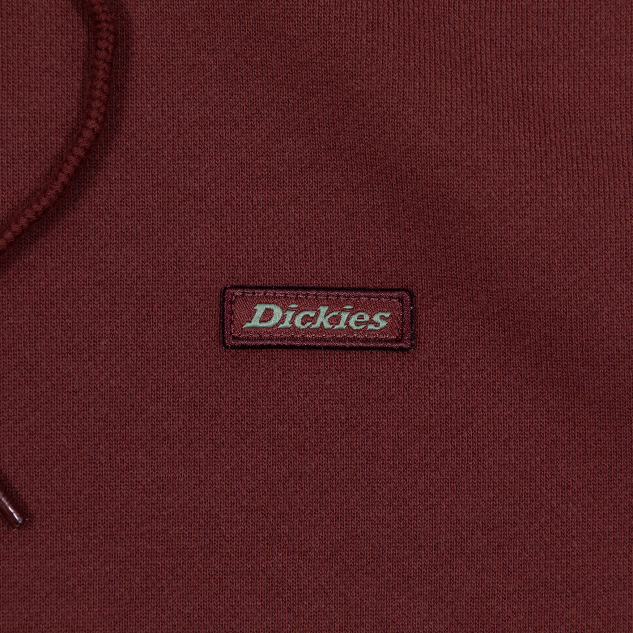 brown dickies hoodie with small green logo
