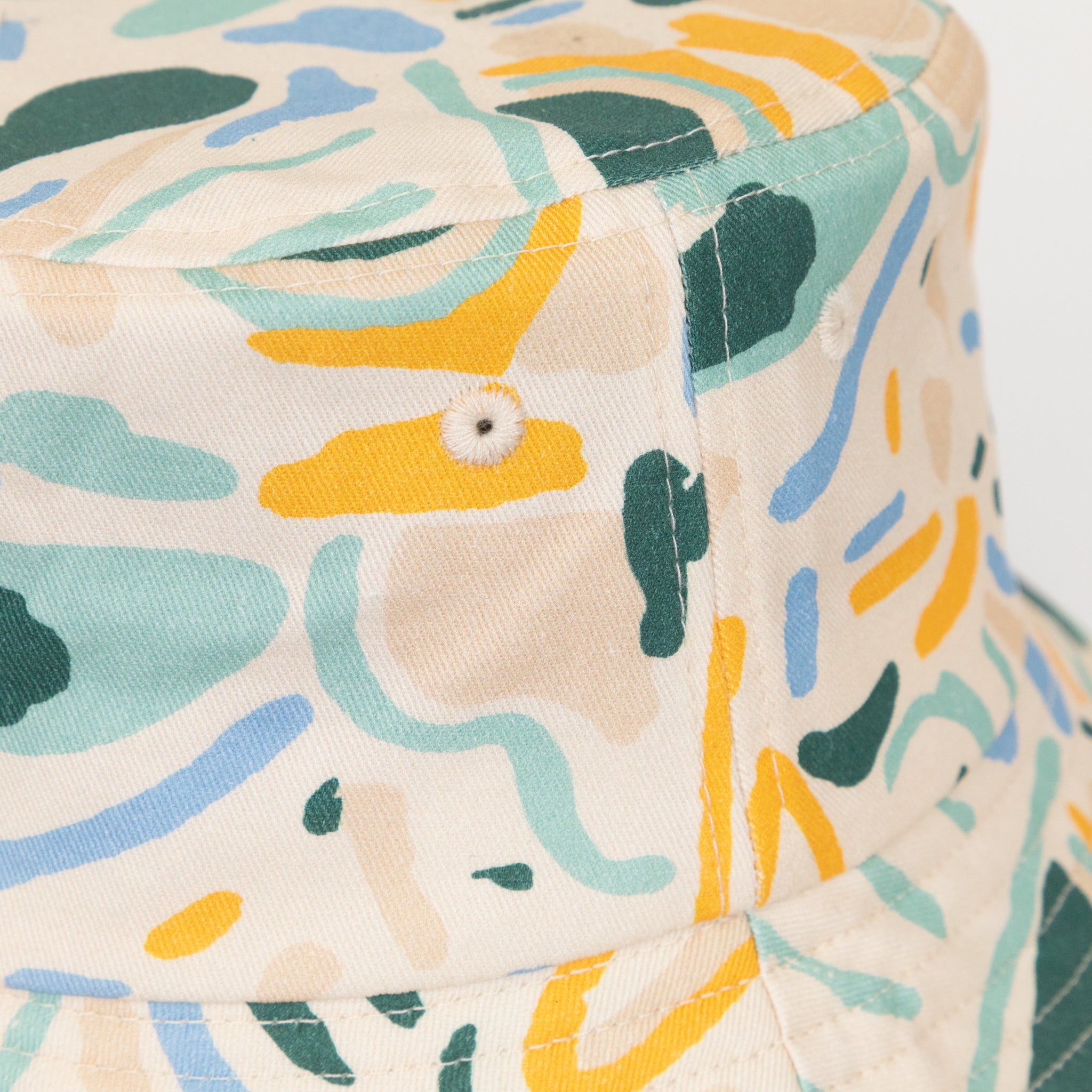 parlez dome bucket hat yellow blue green pattern