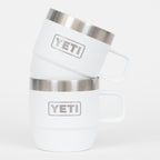 White YETI tumblers with silver insulation on a white background