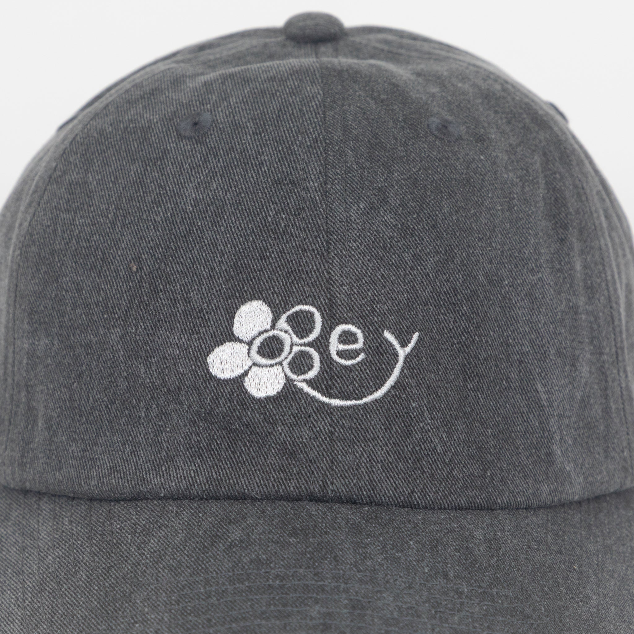 OBEY Flower Strapback Cap in WASHED BLACK