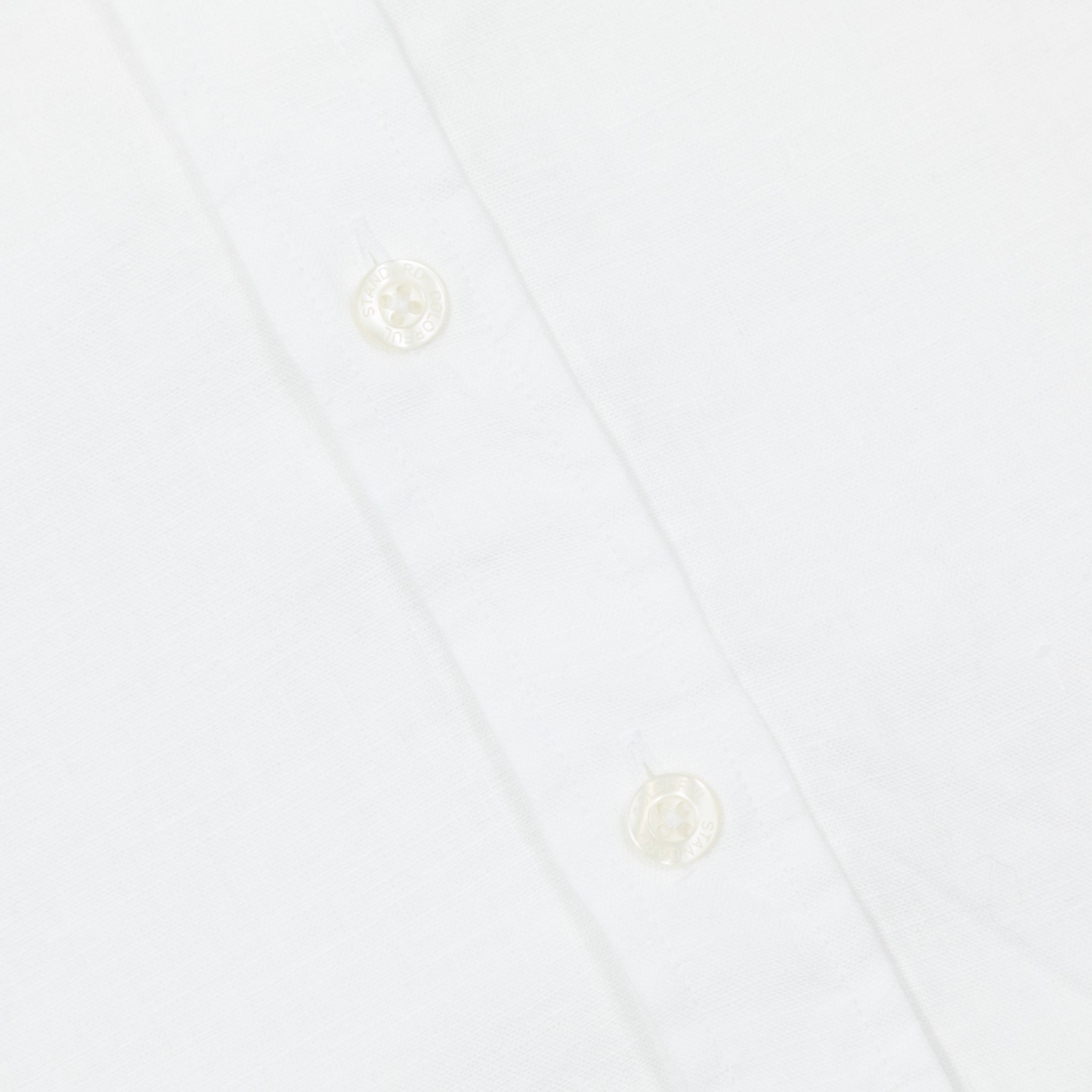 button up detail of colorful standard linen shirt