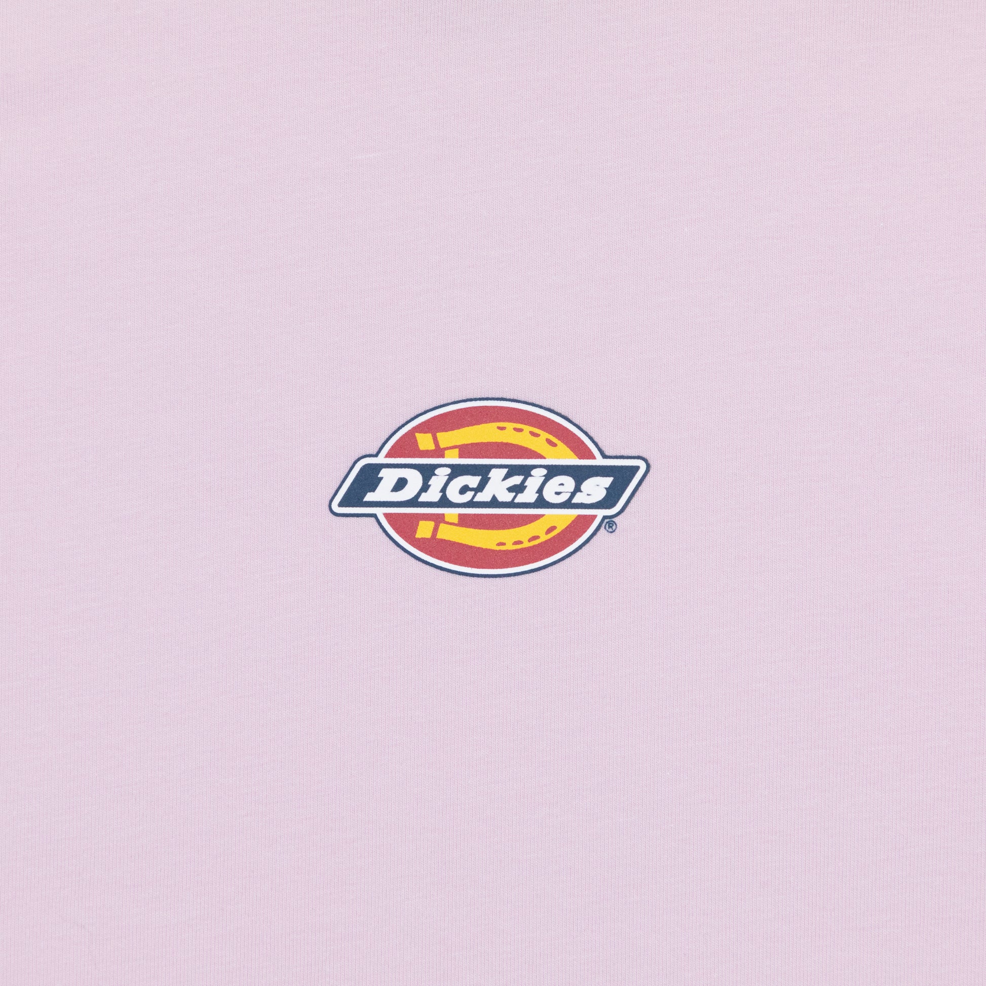 close-up of dickies logo on light pink maple valley top