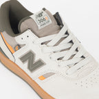 NEW BALANCE Numeric 306 Trainers in Cream & Olive