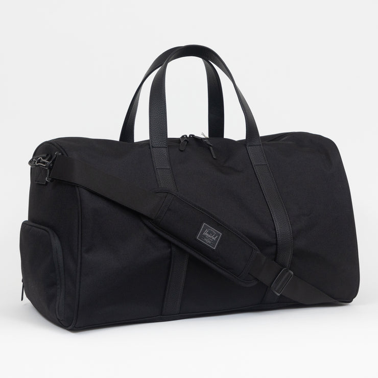 HERSCHEL SUPPLY CO. Novel Duffle Bag in BLACK