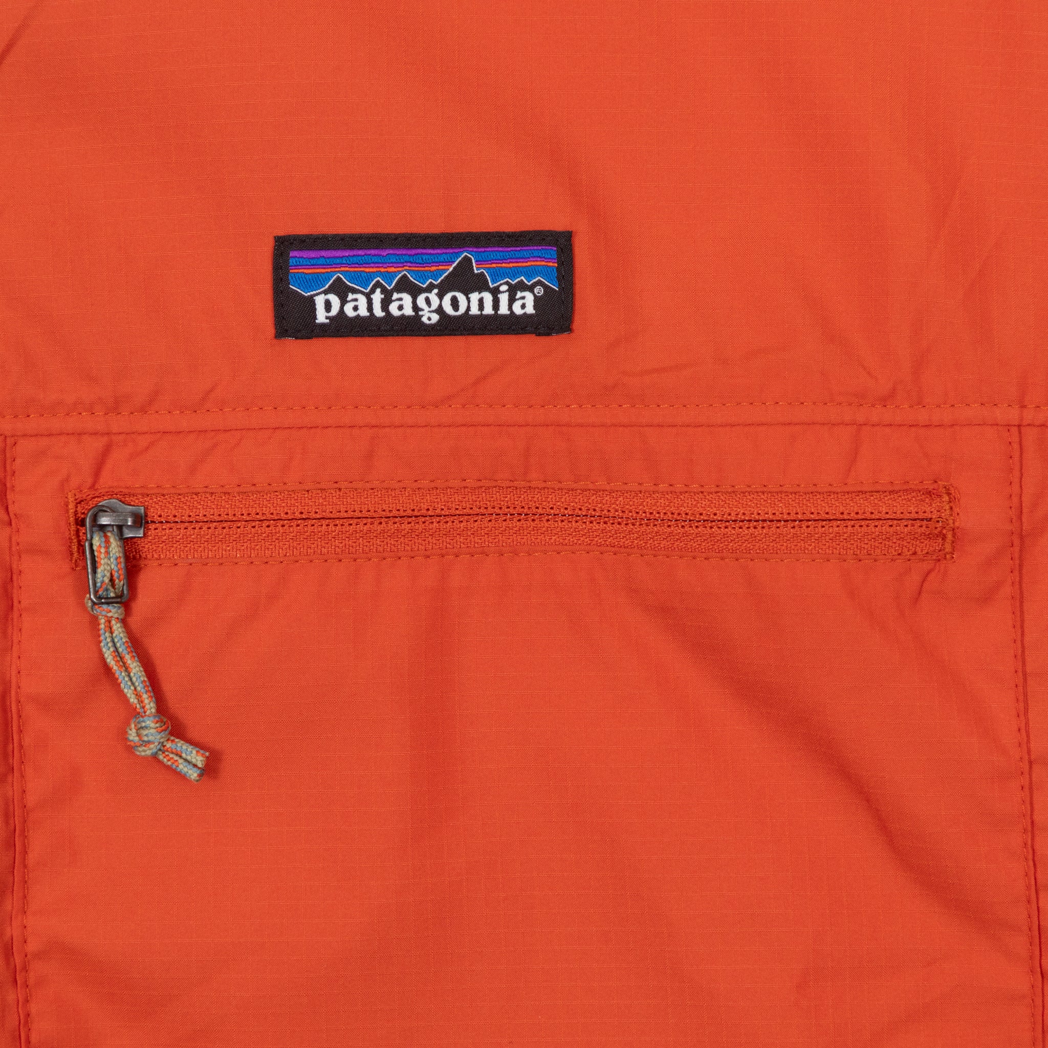 PATAGONIA Light & Variable Jacket in COAL ORANGE