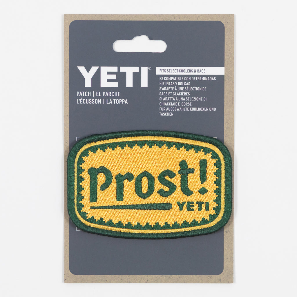 YETI patch with 'Prost!' text in packaging