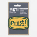 YETI patch with 'Prost!' text in packaging