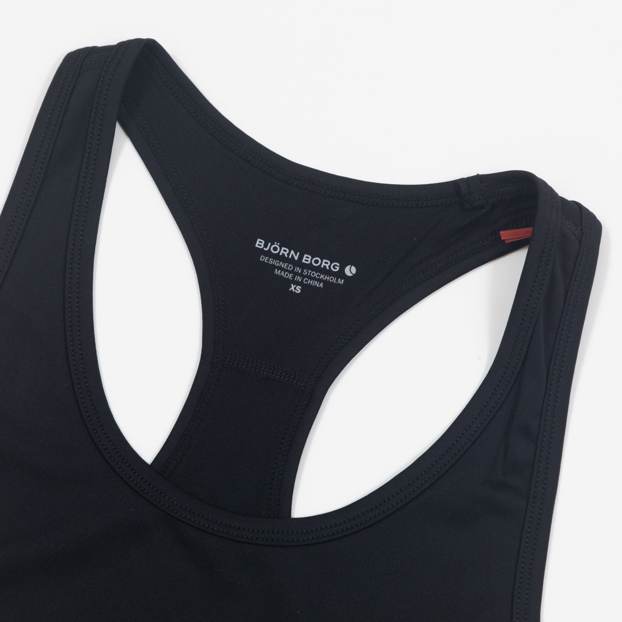 Black sports bra with Björn Borg logo on a white background