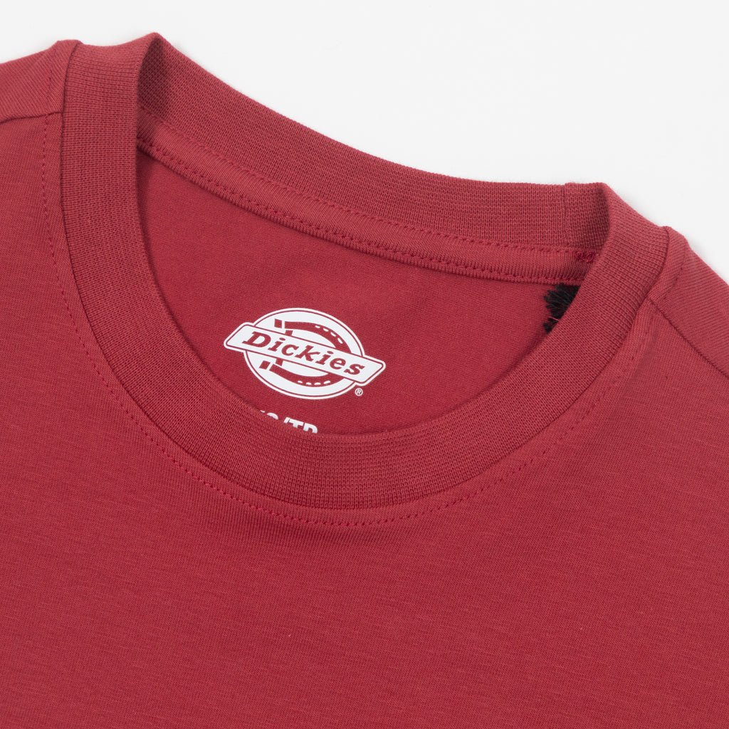 Red t-shirt with Dickies logo on the collar against a white background