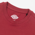 Red t-shirt with Dickies logo on the collar against a white background
