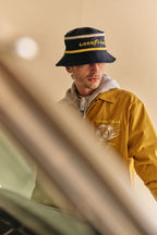 BRIXTON Goodyear Service Bucket Hat in NAVY
