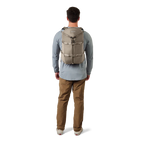Man wearing YETI beige backpack 