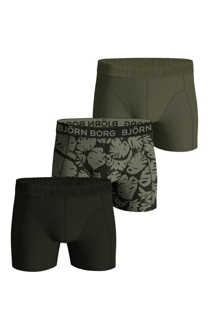 Three pairs of Bjärn Borg boxer briefs in black, green, and leaf pattern on a white background.