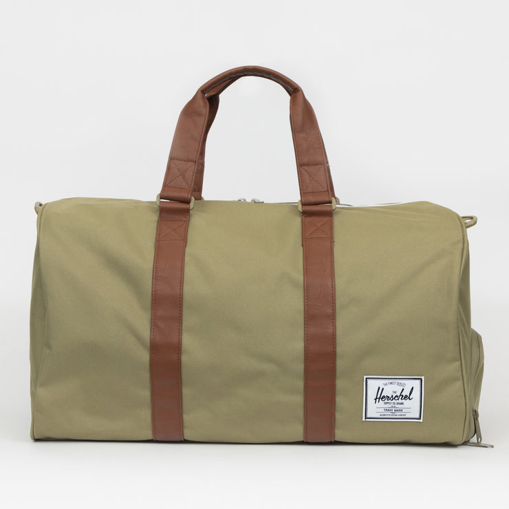 HERSCHEL SUPPLY CO. Novel Duffle Weekend Bag in DRIED HERB GREEN